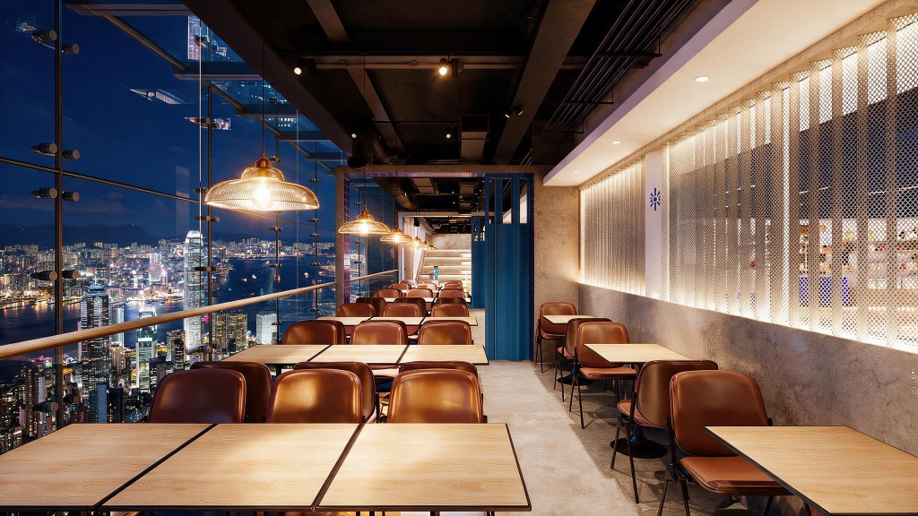 Dining room at NOOK looking over Hong Kong harbour at night
