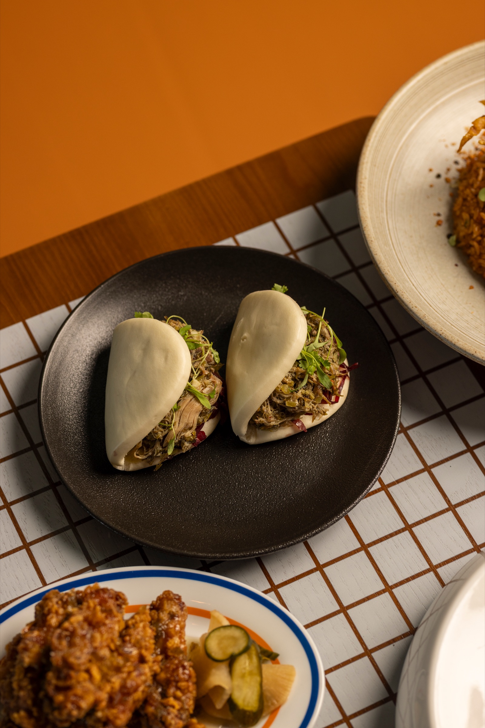 Duck confit and snow cabbage bao at NOOK@The Peak